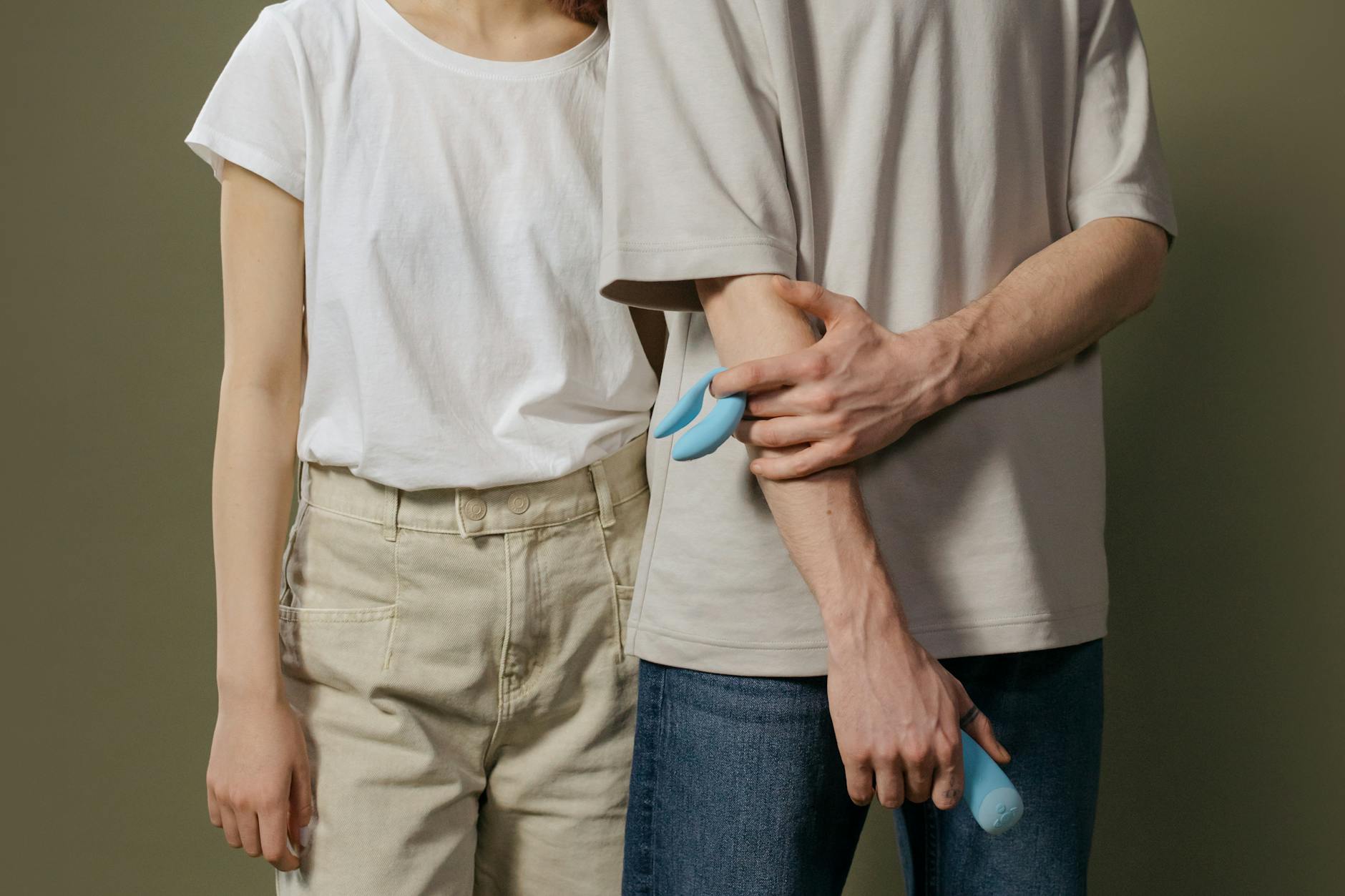 A couple standing together indoors, rebuilding intimacy and connection.